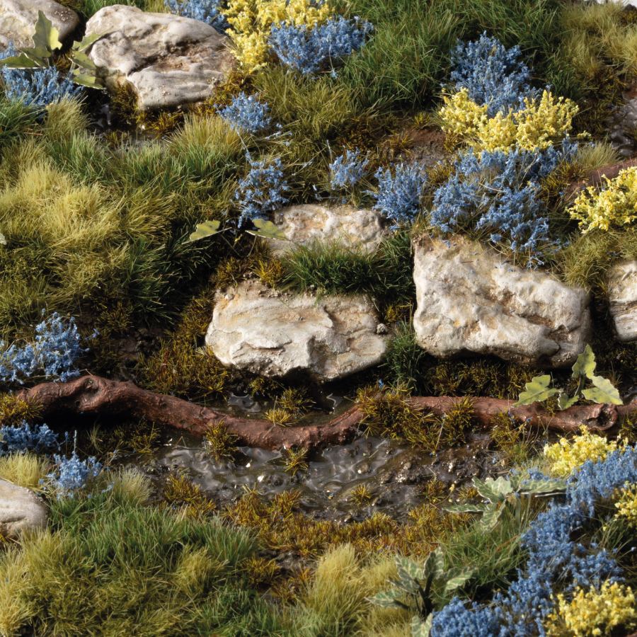 Gamers Grass Flower Tufts - Bluebeard Flowers (6mm) used on a miniature scenic base