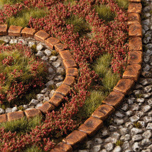 Gamers Grass Flower Tufts - Red Camellia Flowers (6mm) used on a miniature scenic base