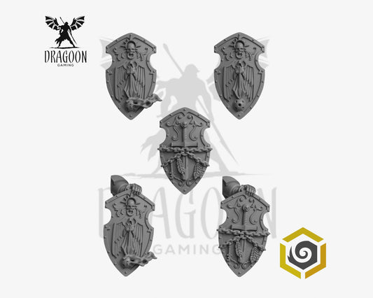 Set of five Eternal Pilgrim Terminator shields by Greytide Studios 3d printed in grey resin for use in 28mm and 32mm tabletop wargames. This item is also compatible with Primaris sized Space Marines and Dark Angels in Warhammer 40K