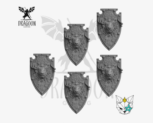 Set of five lion shields by Marta Punkgirl 3d printed in grey resin for use in 28mm and 32mm tabletop wargames. This item is also compatible with Primaris sized Space Marines and Dark Angels in Warhammer 40K